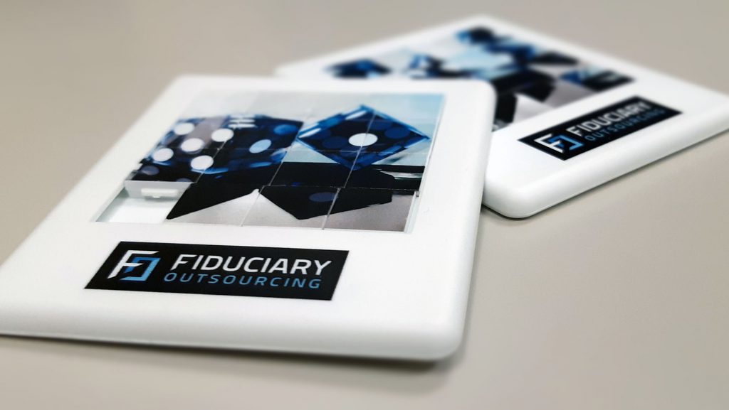 Fiduciary Outsourcing event merchandise: branded slide puzzle toy