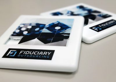 Fiduciary Outsourcing event merchandise: branded slide puzzle toy