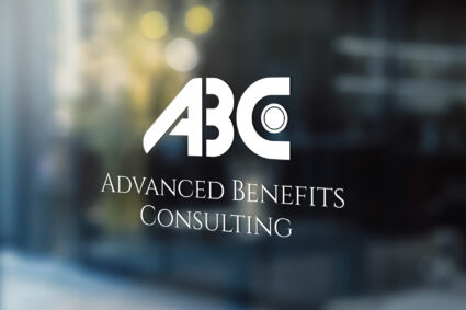 ABC logo decal in white displayed on a glass window