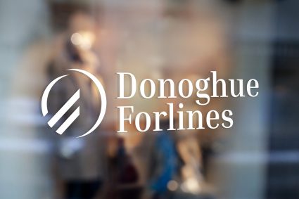 White Donoghue Forlines logo decal on a window