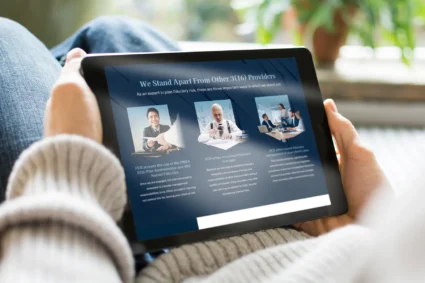FCG website displayed on a tablet device, held horizontally