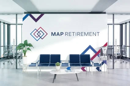 A decorative wall decal displaying the MAP Retirement logo at large scale in the office