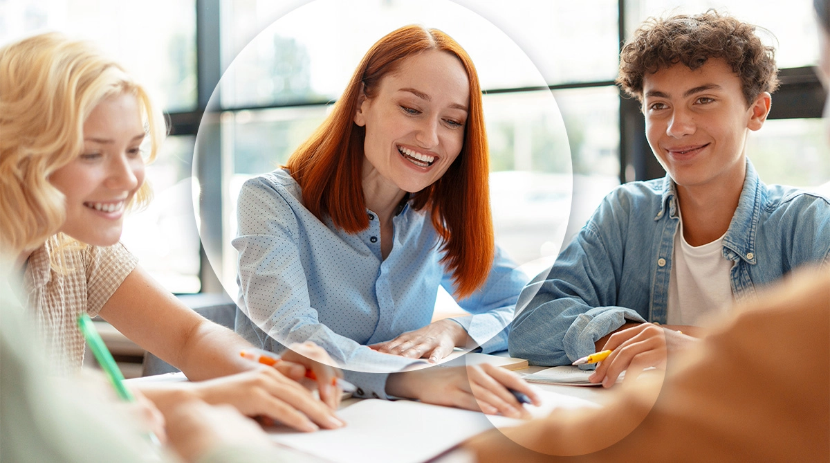 Young teacher working with middle school students