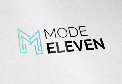 Mode Eleven logo printed on high-quality textured paper