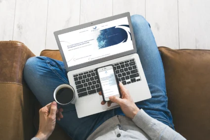 Blue Ocean Strategies website on couch with coffee