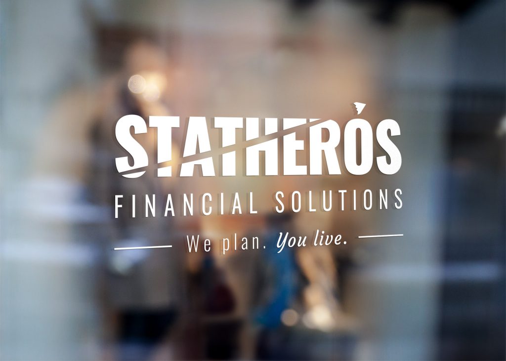 White Statheros logo decal on a glass office door